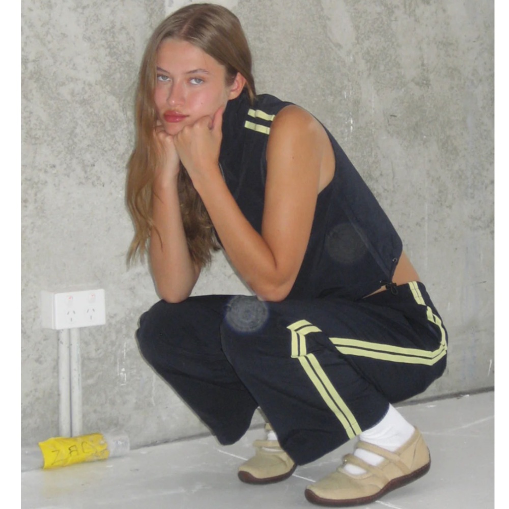 with jéan navy blue and yellow zip-up vest